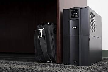 APC 2200VA Smart-UPS with SmartConnect, pure sinewave, line interactive uninterruptible power supply on a desk.