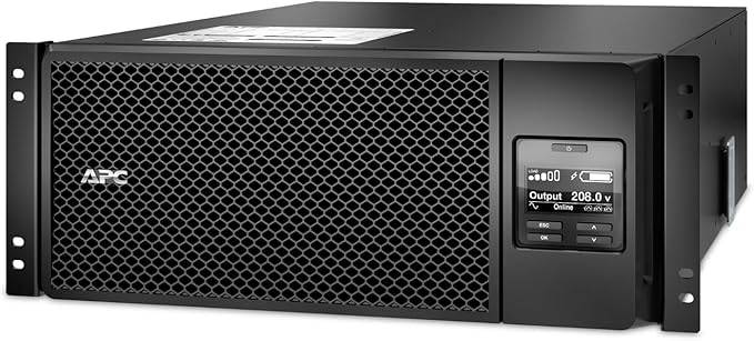 APC Smart-UPS SRT 6000VA RM 208V IEC uninterruptible power supply unit on a server rack, with display panel and power connectors.