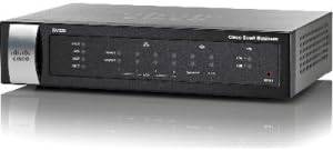 Cisco RV320-K9-NA dual WAN VPN router with multiple Ethernet ports and security features, shown in a professional workspace setting.