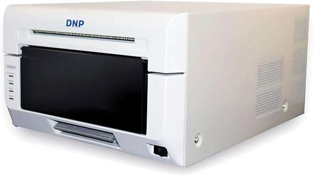 DNP DS620A professional photo printer by Beaver Computer showing the compact device with control panel and paper output tray.