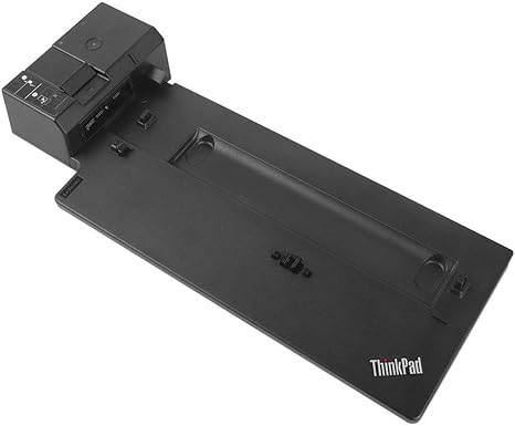 Lenovo ThinkPad Ultra Docking Station US 40AJ0135US connected to a laptop with multiple ports and cables, on a desk.