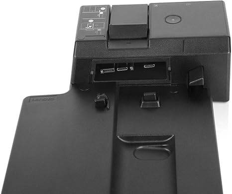 Lenovo ThinkPad Ultra Docking Station US 40AJ0135US connected to a laptop with multiple ports and cables, on a desk.