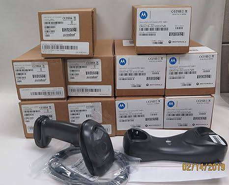 Beaver Computer LI4278 wireless 1D barcode scanner with cradle and USB cable, shown on a clean workspace.