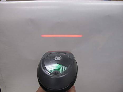Beaver Computer LI4278 wireless 1D barcode scanner with cradle and USB cable, shown on a clean workspace.