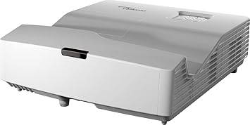 Optoma EH340UST 3D Ultra Short Throw DLP Projector displaying a colorful image on a wall, with a sleek black design.