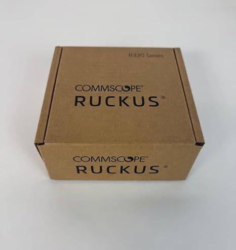 Indoor Ruckus R320 wireless access point by Beaver Computer, mounted on a wall with Ethernet cables connected.