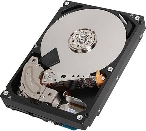 Toshiba MG04ACA 6TB 3.5-inch internal hard drive for computers, featuring a black metal casing and SATA connector.