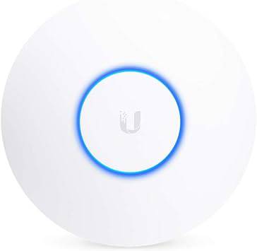 Ubiquiti UniFi HD 802.11ac Wave 2 Enterprise Wi-Fi Access Point mounted on a wall, black rectangular design with indicator lights