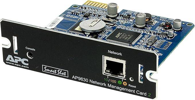 APC AP9630-1 UPS network management card installed in a server rack for remote monitoring and management of power systems