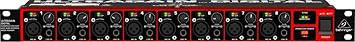 Behringer ADA8200 8-in/8-out ADAT audio interface with MIDAS mic preamps, showing front panel with input and output ports.