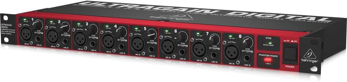 Behringer ADA8200 8-in/8-out ADAT audio interface with MIDAS mic preamps, showing front panel with input and output ports.