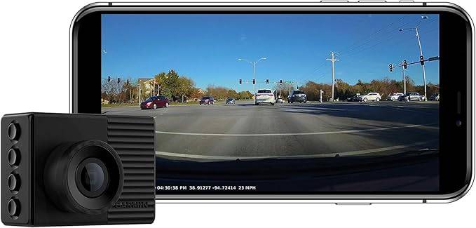 Garmin Dash Cam 56 compact dashboard camera capturing road view and vehicle interior for recording and security.
