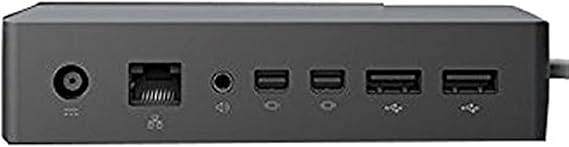Microsoft Surface Dock connected to Surface Pro 4 and Surface Book, featuring multiple ports and sleek design