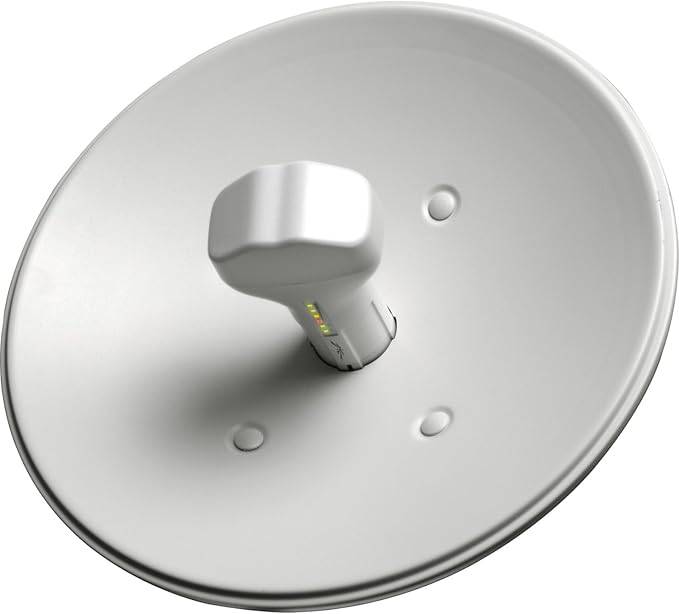 Ubiquiti NanoBridge NB-5G25 wireless bridge in outdoor setting, showcasing its compact design and antenna for long-range connectivity.