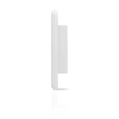 Ubiquiti Networks UniFi dimmer switch with 802.3af PoE, mounted on a wall with electrical wiring visible.