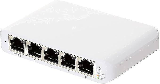 Ubiquiti UniFi Switch USW-Flex-Mini with multiple Ethernet ports and compact design, installed in a network setup